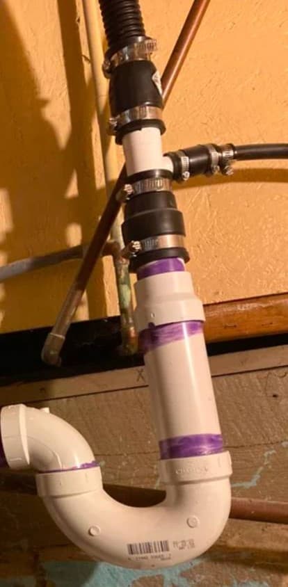 picture of a pvc pipe that has recently been fixed by a plumber in bronx new york
